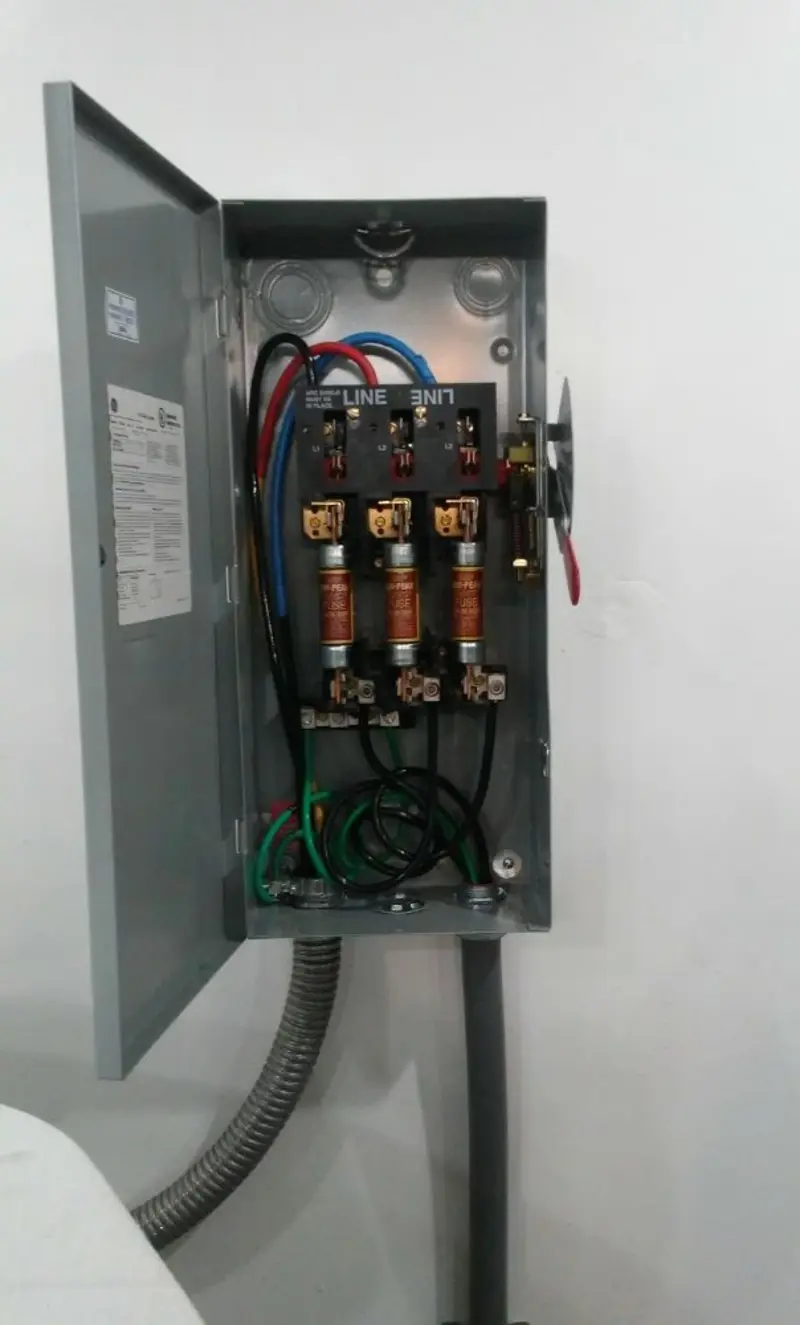 Three-phase disconnect switch installed for Smoke Detector Installation in Tamiami