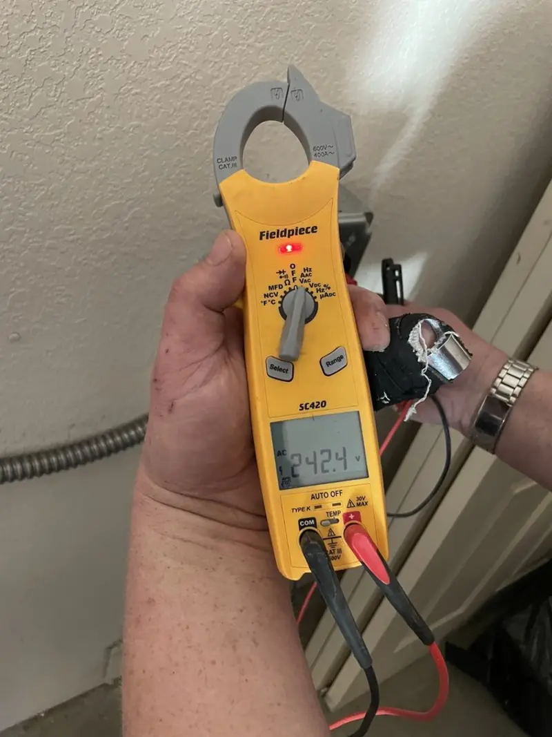 Voltage testing with clamp meter during Generator Installation in Tamiami
